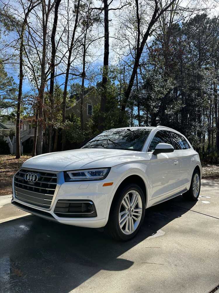 White Audi SUV from Holy City Details’ public Nextdoor post